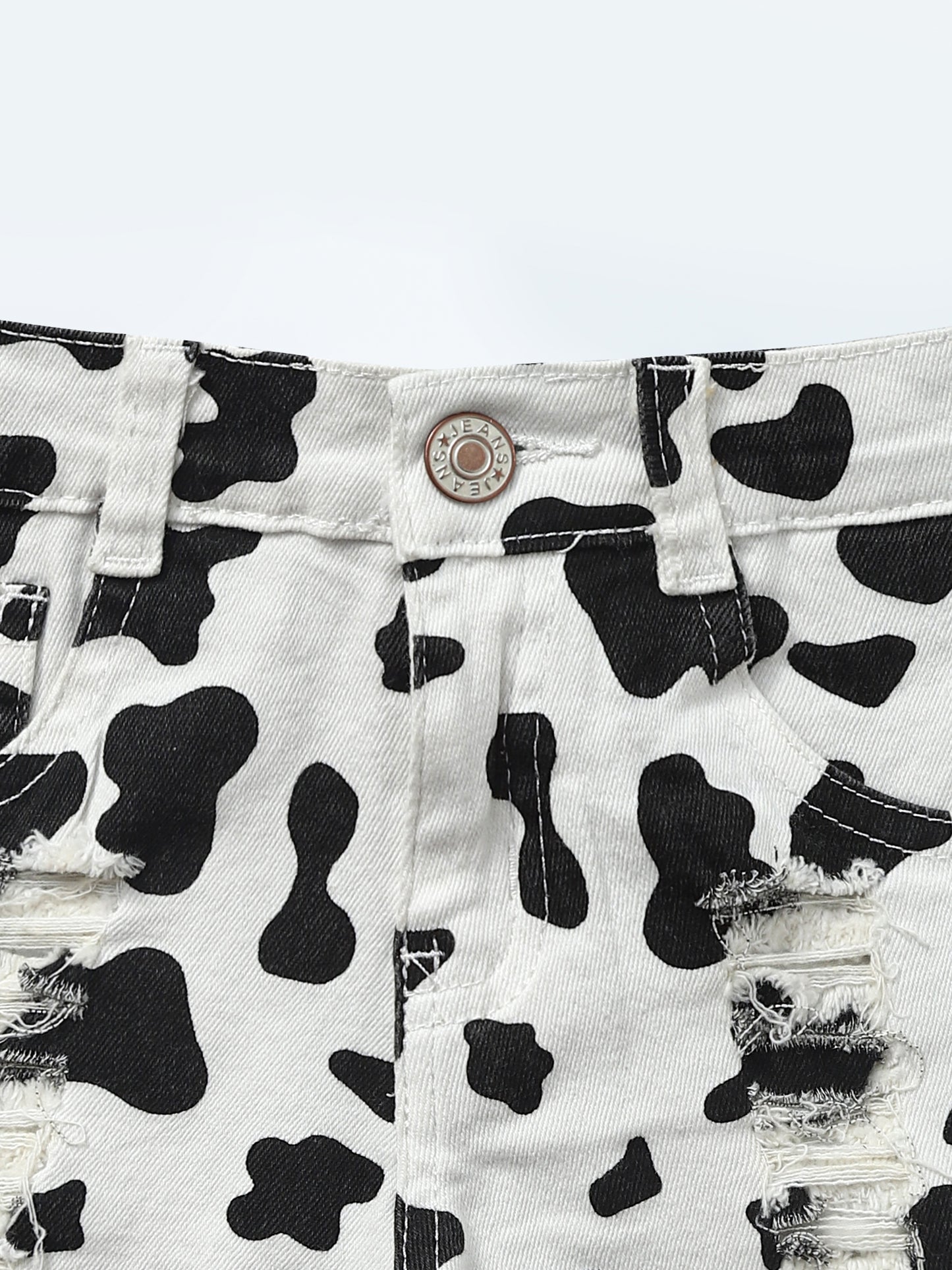 Cow Printed Distressed Denim Shorts